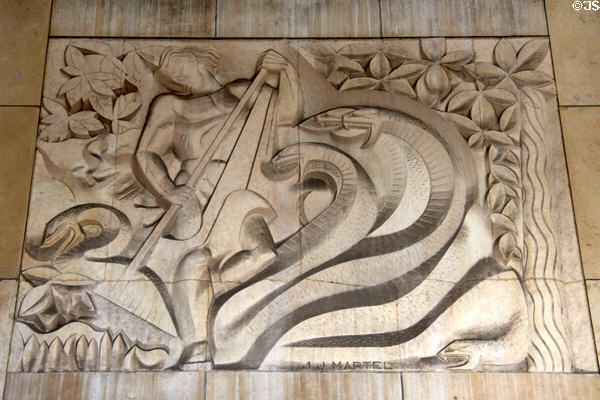 Male figure with serpents bas-relief sculpture (1937) by J.J. Martel at Palais de Chaillot. Paris, France.