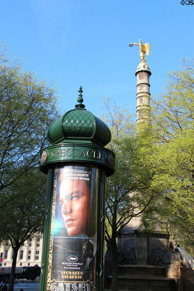 Morris column (1868) classic advertising street furniture of Paris. Paris, France.