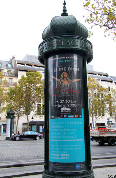 Morris column (1868) classic advertising street furniture of Paris. Paris, France.