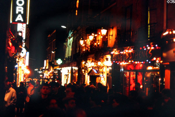 At night along Latin Quarter restaurants. Paris, France.