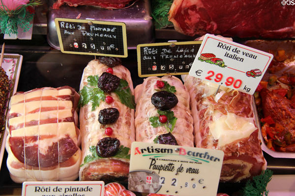 Artisan butcher shop roasts. Paris, France.