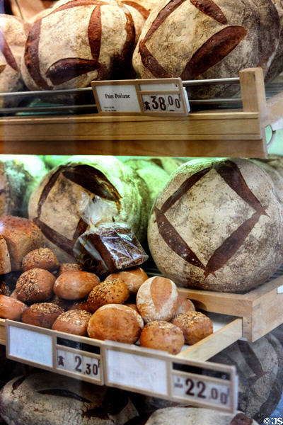 Round breads in bakery. Paris, France.