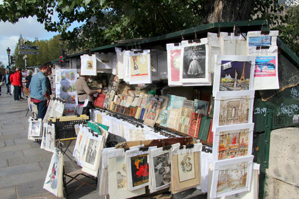 Art stalls on wall of Seine River. Paris, France.
