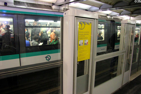 Metro safety doors with warnings. Paris, France.