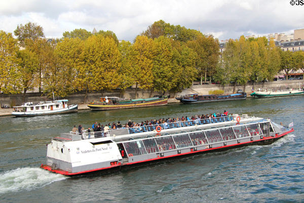 Tourist boat on Seine. Paris, France.