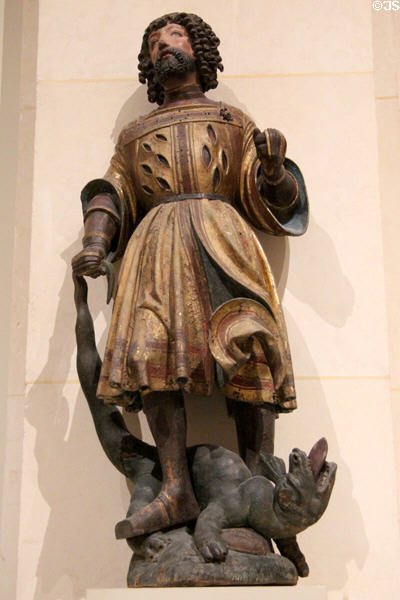 St George slaying dragon wood carving (c1550-20) attrib. Master of Rabenden from Upper Bavaria at Museum of Decorative Arts. Paris, France.