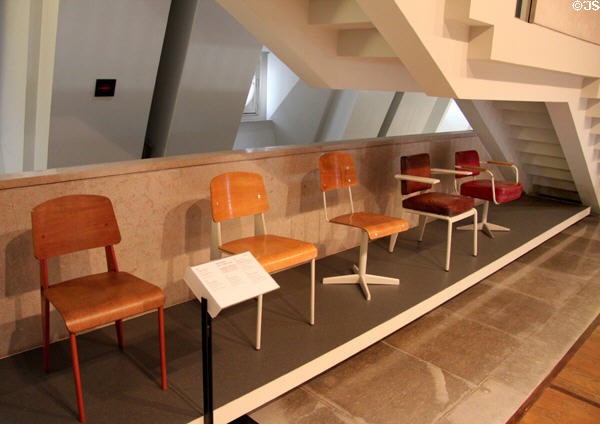 Series of office chairs (1930s-50s) by Jean Prouvé of France at Museum of Decorative Arts. Paris, France.