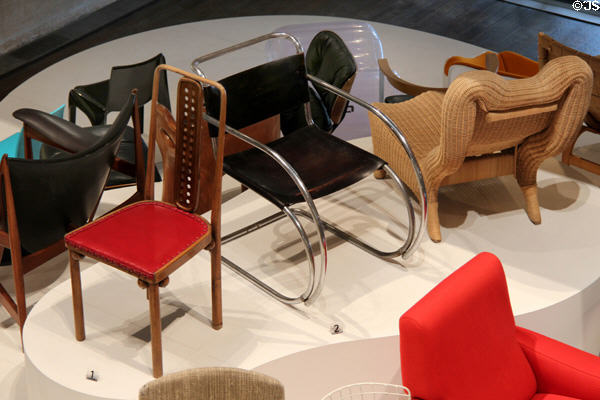 Chair (1904) by Josef Hoffmann; tubular armchair (1927) by Ludwig Mies Van der Rohe: & woven chair (1942) by Jacques Dumond at Museum of Decorative Arts. Paris, France.