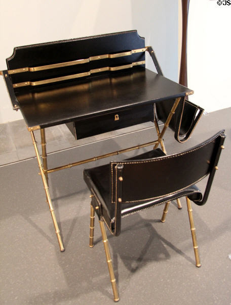 Artificial leather chair & desk (c1950) by Jacques Adnet from France (shown Brussels EXPO 1958) at Museum of Decorative Arts. Paris, France.