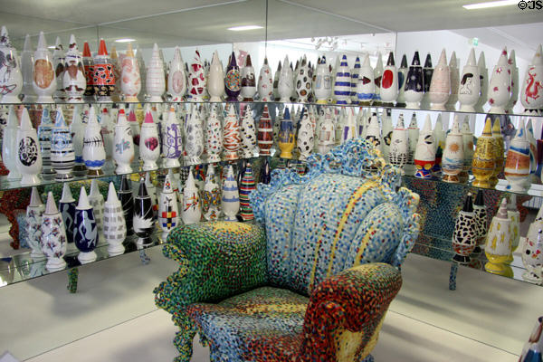 Poltrona di Proust armchair (1979) by Alessandro Mendina of Italy surrounded by vases by 99 artists at Museum of Decorative Arts. Paris, France.