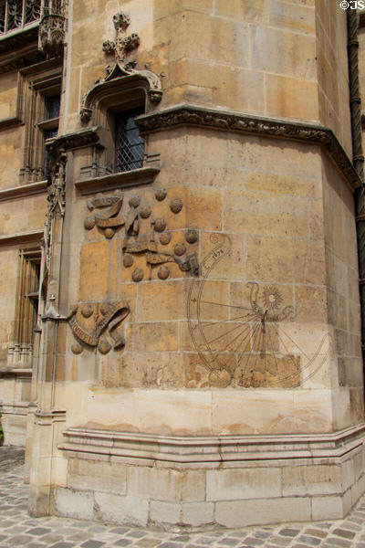 Sundial on wall at Cluny Museum. Paris, France.