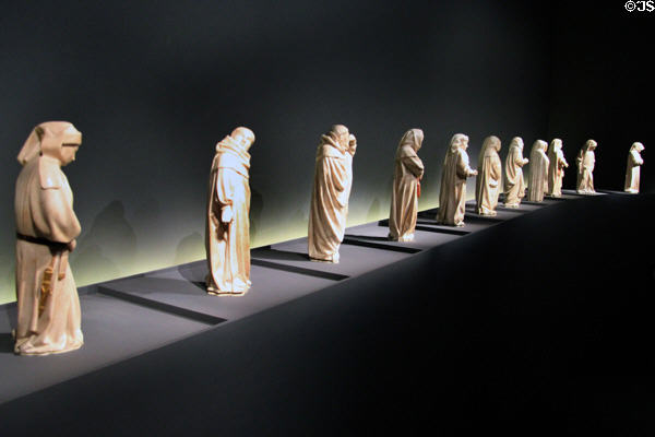 Alabaster tears sculpture group (1443-70) of monks to cry at tomb of Jean the Fearless, duc de Bourgogne by Jean de la Huerta at Cluny Museum. Paris, France.