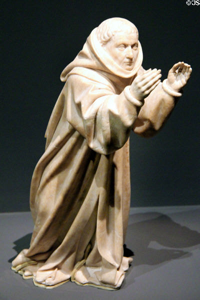 Mourner from Alabaster tears sculpture group (1443-70) by Jean de la Huerta at Cluny Museum. Paris, France.