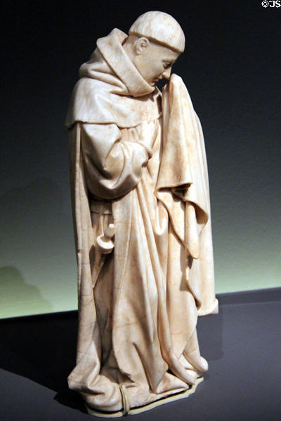 Mourner from Alabaster tears sculpture group (1443-70) by Jean de la Huerta at Cluny Museum. Paris, France.