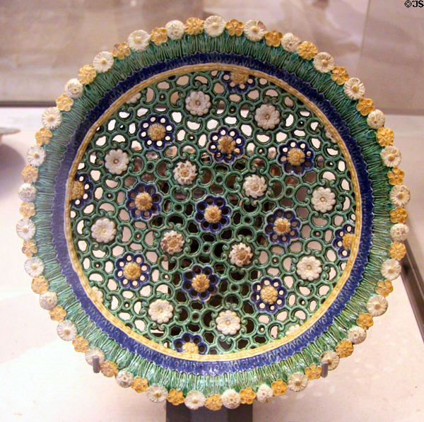 Ceramic plate with latticework of flowers (early 17thC) from Lisieux? at Petit Palace Museum. Paris, France.