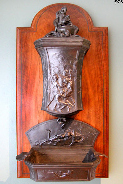 Hand washing fountain of tin & wood (1894) by Alexandre-Louis-Marie Charpentier at Petit Palace Museum. Paris, France.