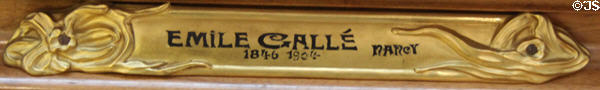Art Nouveau company name of Émile Gallé display case for glass (1904) at Arts et Metiers Museum. Paris, France.