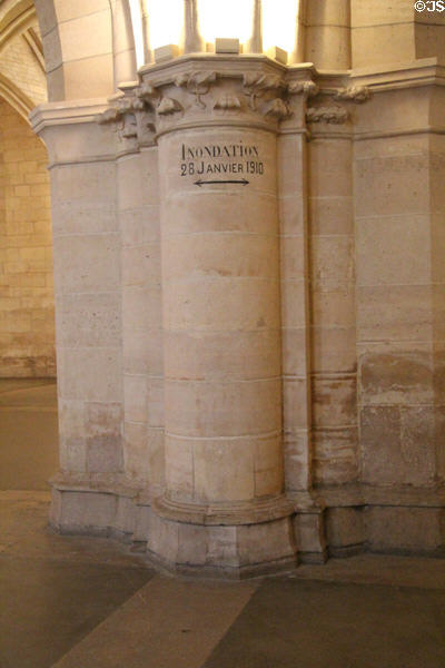 Marker of flooding from Seine River Jan 28, 1910 in Salle des Gens d'Armes at Conciergerie. Paris, France.