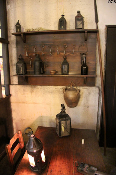 Furnishings of reproduction of guards room for Marie-Antoinette's cell by a screen at Conciergerie. Paris, France.