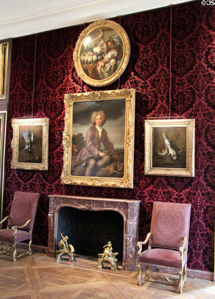 Portrait of hunter over fireplace at Museum of Hunting & Nature. Paris, France.