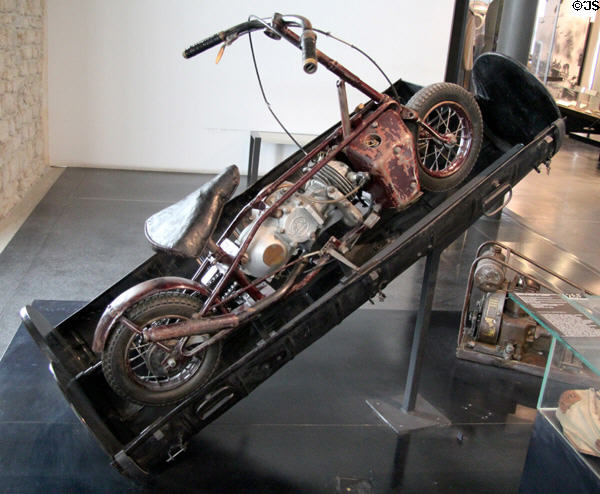 Folding WWII English Welbike motorcycle in its parachute drop-container at Army Museum at Les Invalides. Paris, France.