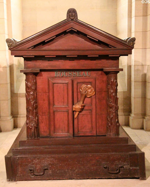 Monument to Jean-Jacques Rousseau (1712-78) with hand reaching the torch of knowledge from the door of the grave at Pantheon. Paris, France.