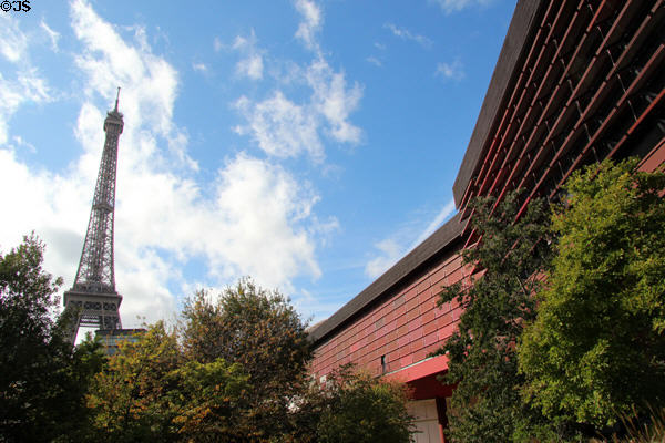 Eiffel Tower seen from garden courtyard of Musée du quai Branly. Paris, France.