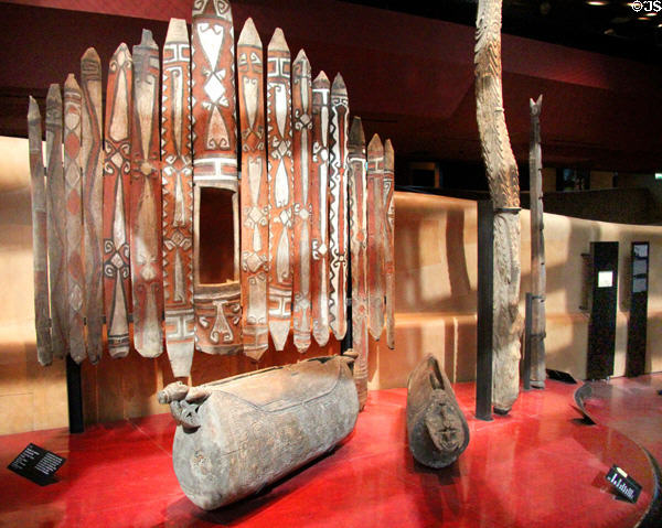 South Pacific ceremonial house front, drums & poles at Musée du quai Branly. Paris, France.