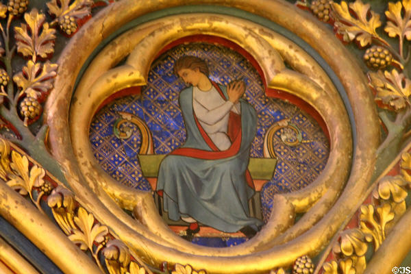 Painted biblical scene in Gothic tetrafoil (13thC) surrounded by Fleur-de-Lys at St Chapelle. Paris, France.