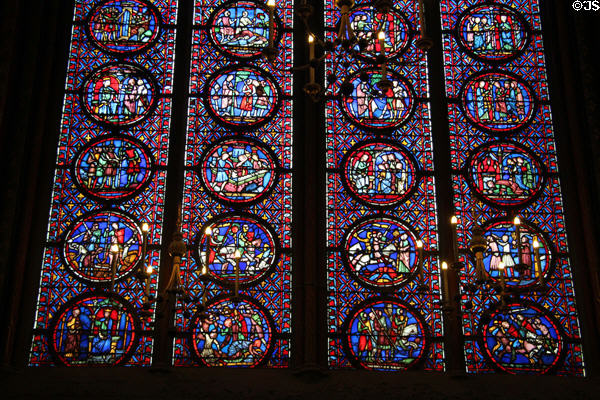 Stained glass with scenes of knightly combat at St Chapelle. Paris, France.