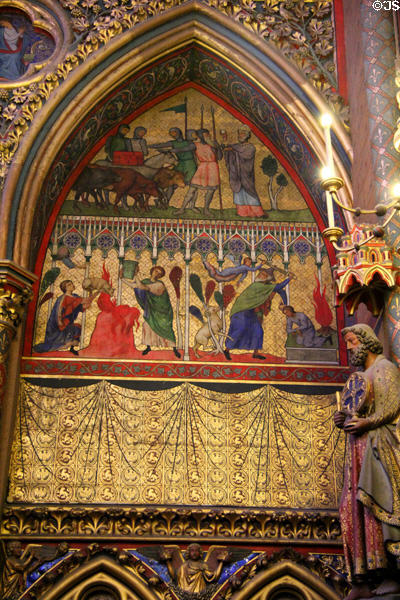 Angel stays hand of Abraham sacrificing son Isaac painted scene at St Chapelle. Paris, France.