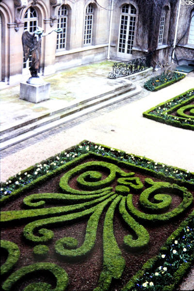 Courtyard with original version of Victory statue on Chatelet Column at Carnavalet Museum. Paris, France.