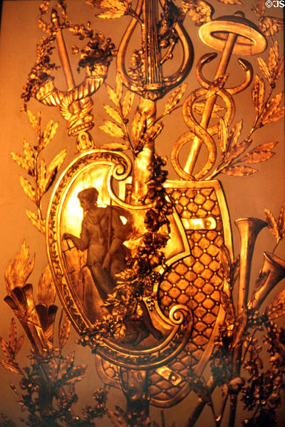 Detail of gold filigree wall decoration in period room at Carnavalet Museum. Paris, France.