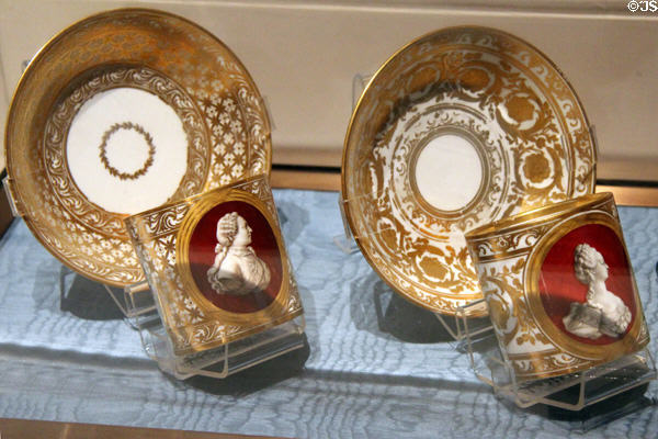 Pair of cups & saucers with the profiles of Louis XVI & Queen Marie-Antoinette made by Sèvres factory at Carnavalet Museum. Paris, France.