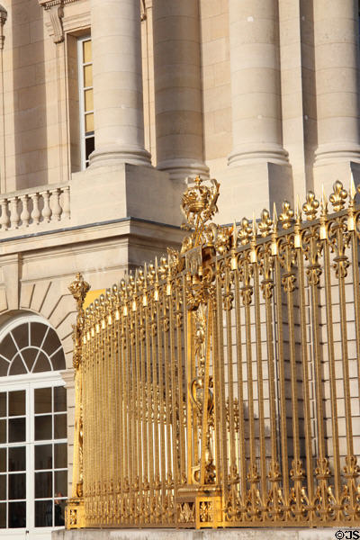 Royal Court gilded fence at Versailles Palace. Versailles, France.