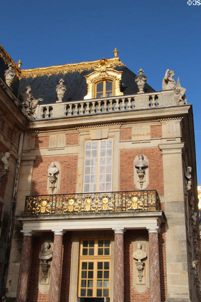 Busts of historic figures on facade of Marble Court at Versailles Palace. Versailles, France.