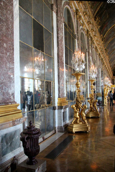 Candelabra stands in Hall of Mirrors at Versailles Palace. Versailles, France.