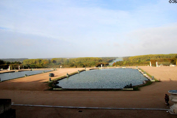 View of gardens from Hall of Mirrors at Versailles Palace. Versailles, France.