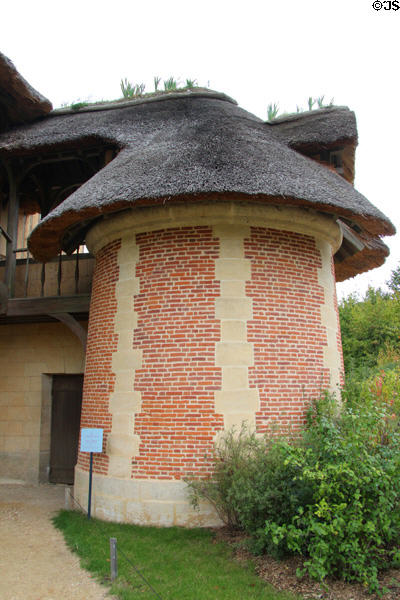 Round tower of Queen's House at Marie Antoinette farm. Versailles, France.