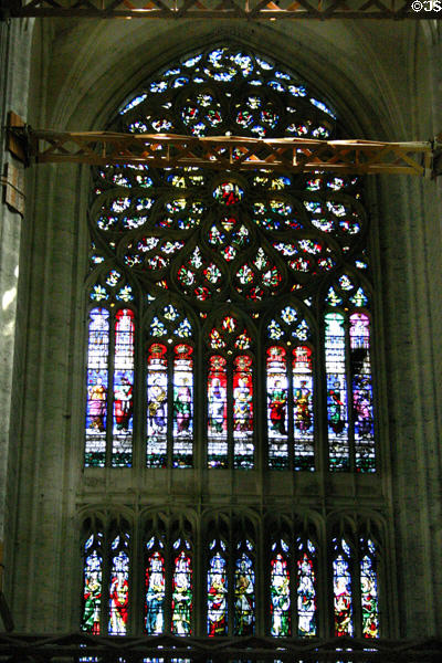 Rose window with Apostles & Prophets underneath with antique supporting brace across foreground at Cathédrale St-Pierre. Beauvais, France.