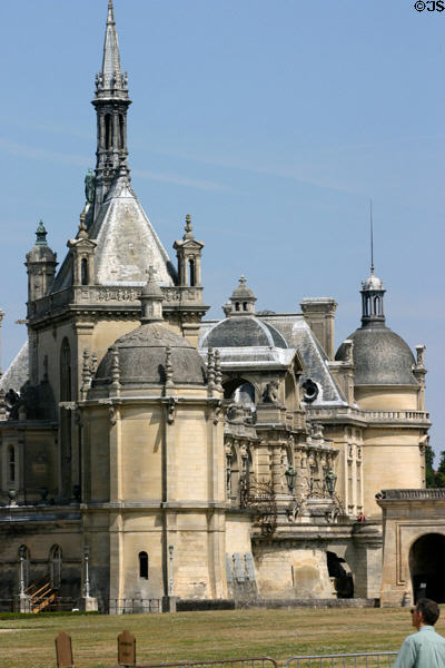 Ornate domes, steeples & spires of Château de Chantilly. Chantilly, France.