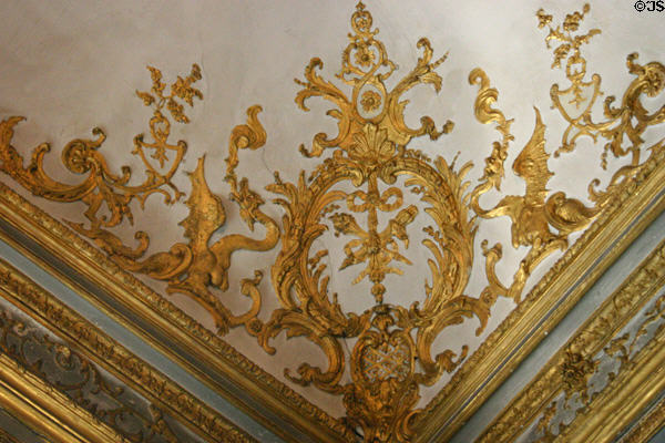 Ceiling corner with gilded filigree in Prince's Room in Petit Château at Château de Chantilly. Chantilly, France.
