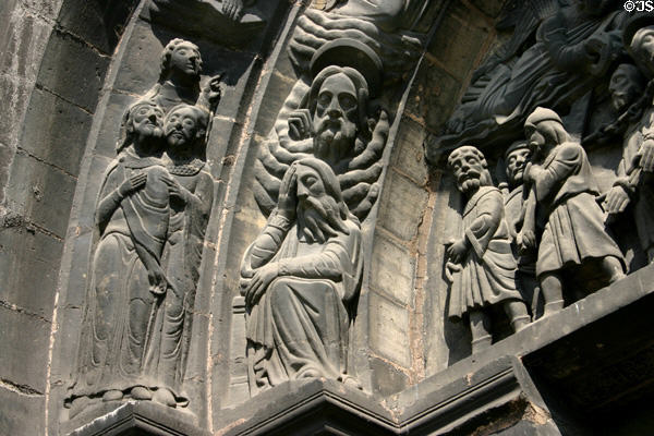 Carved stone figures on archway at St-Denis Basilica. St Denis, France.