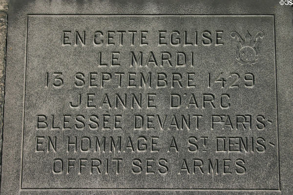Plaque marking visit of Joan of Arc on Sept. 13, 1429, at St-Denis Basilica. St Denis, France.