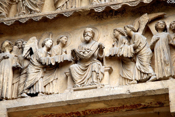 God & Jesus flanked by angels at center of Last Judgment scene on Reims Cathedral. Reims, France.