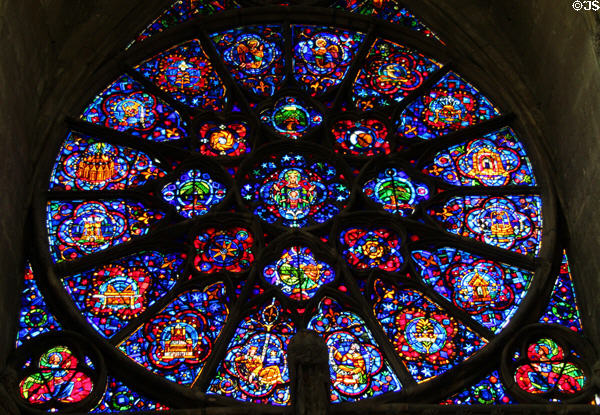 Virgin & child stained glass rose window in Reims Cathedral. Reims, France.