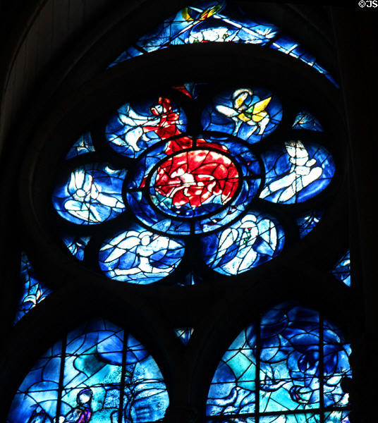 Vision of Apocalypse surrounded by Evangelists detail on Chagall stained glass window at Reims Cathedral. Reims, France.