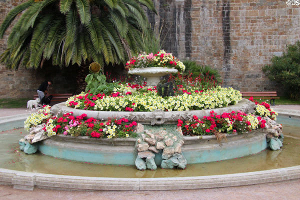 Fountain by walls of Château. St Malo, France.