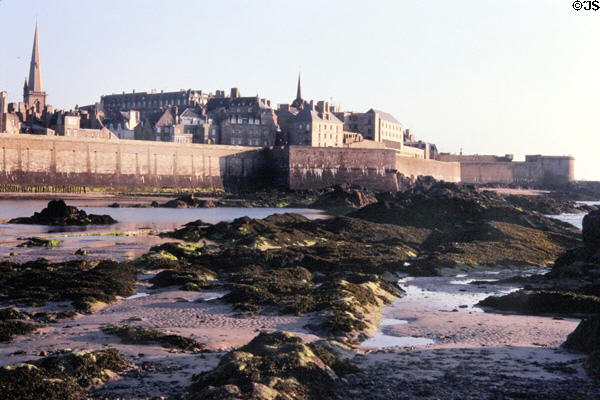 Town & walls seen from beach. St Malo, France.