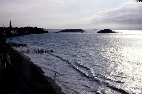 Ocean at high tide & islands at dusk. St Malo, France.